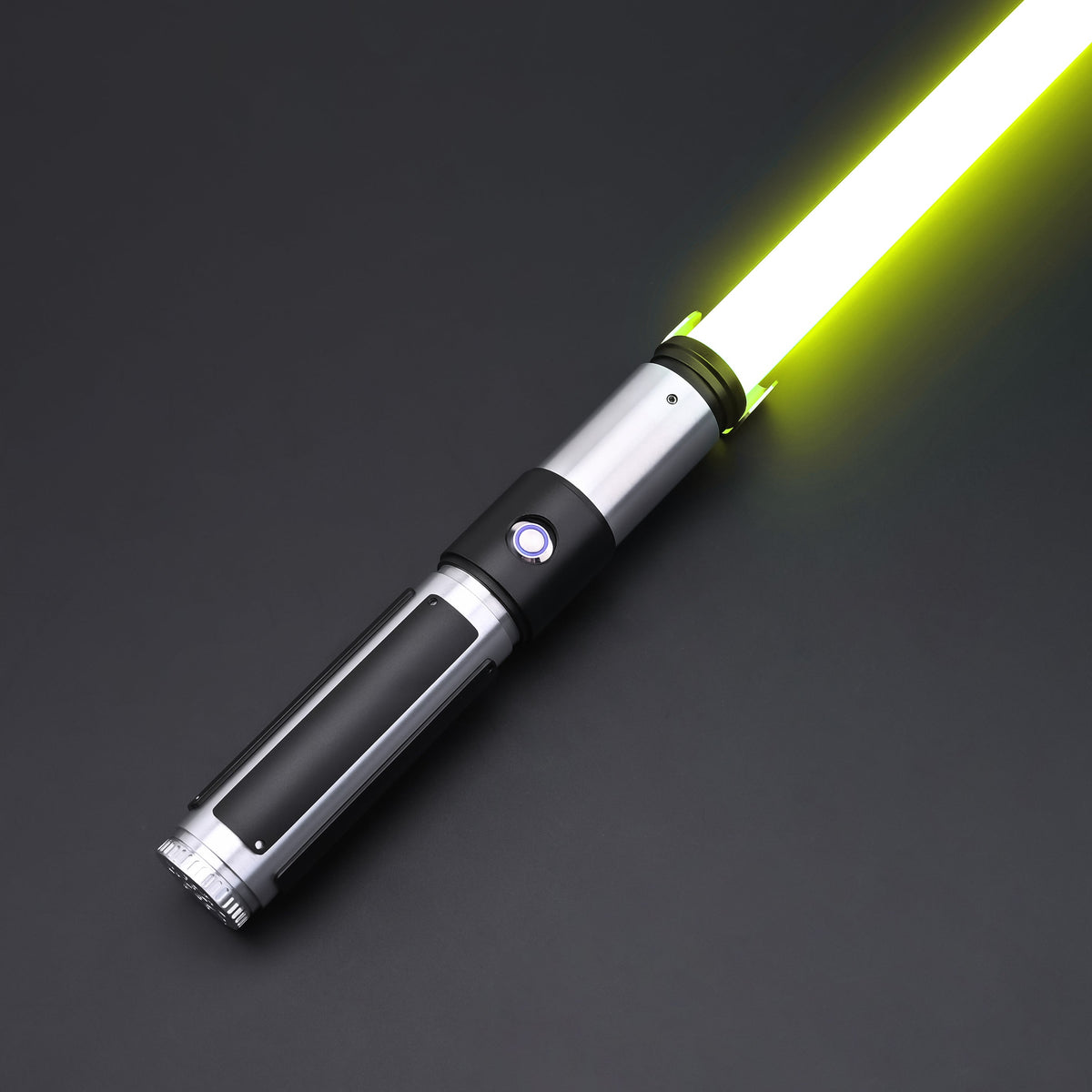 Yoda SE Lightsaber featuring a compact hilt and bright yellow blade on a dark background.