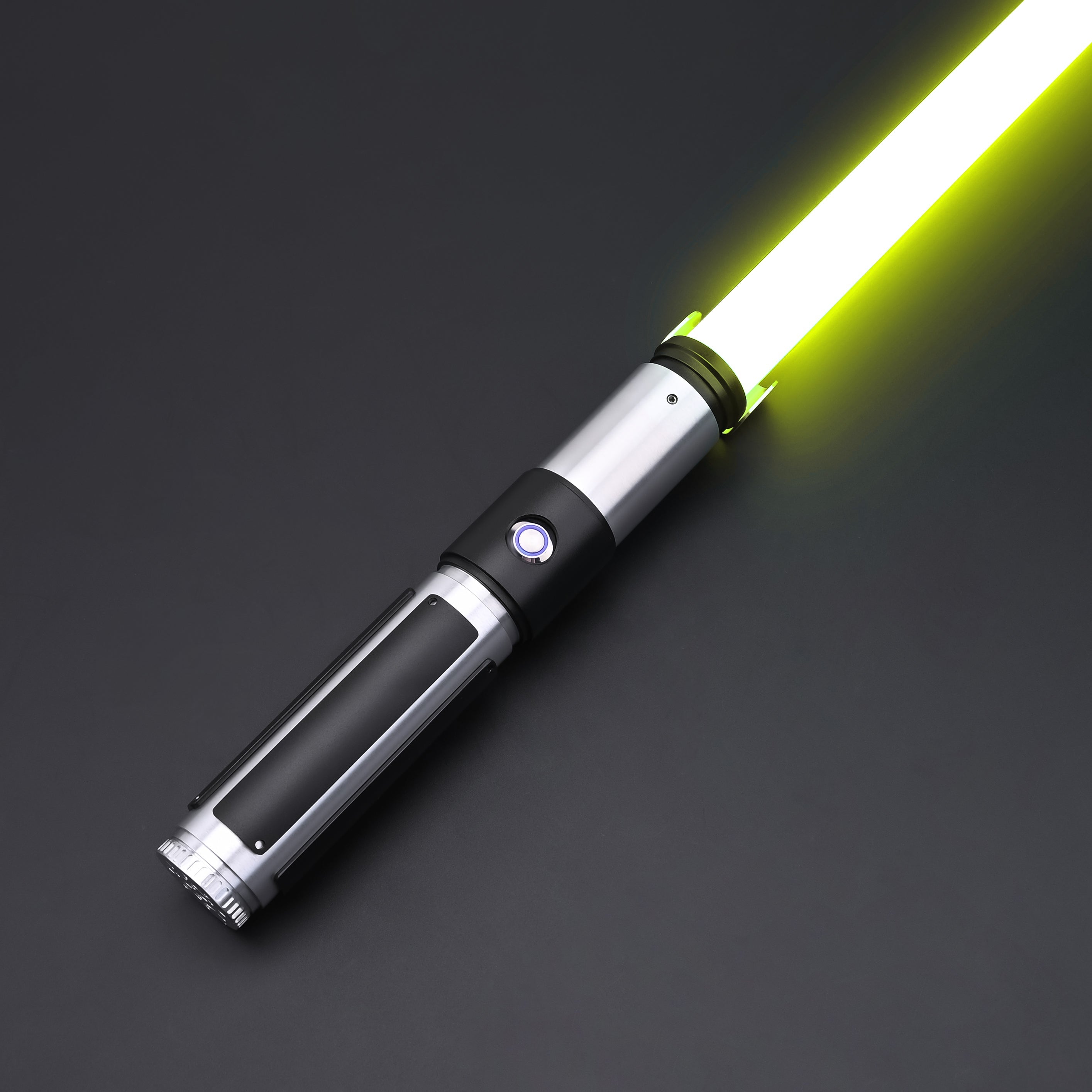 Yoda SE Lightsaber featuring a compact hilt and bright yellow blade on a dark background.